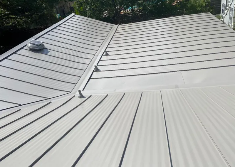 Solar attic fan installed on a metal roof for Roof Ventilation in San Luis Obispo